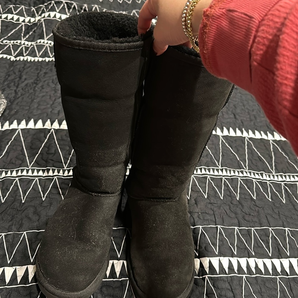 Black tall Ugg boots